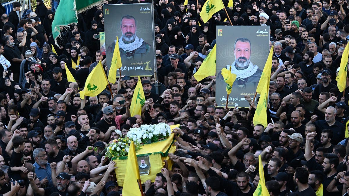 A funeral ceremony held for Yasir Nemir Karnish, the former bodyguard of Hezbollah Secretary General Hassan Nasrallah, who died in clashes on the Israeli-Lebanese border in Beirut, Lebanon on July 10, 2024. Karnish's family and Hezbollah supporters were present.