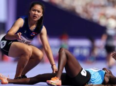 Laotian Olympic sprinter finishes race, turns back to help opponent who collapsed during women’s 100 prelim