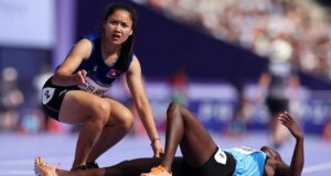 Laotian Olympic sprinter finishes race, turns back to help opponent who collapsed during women’s 100 prelim