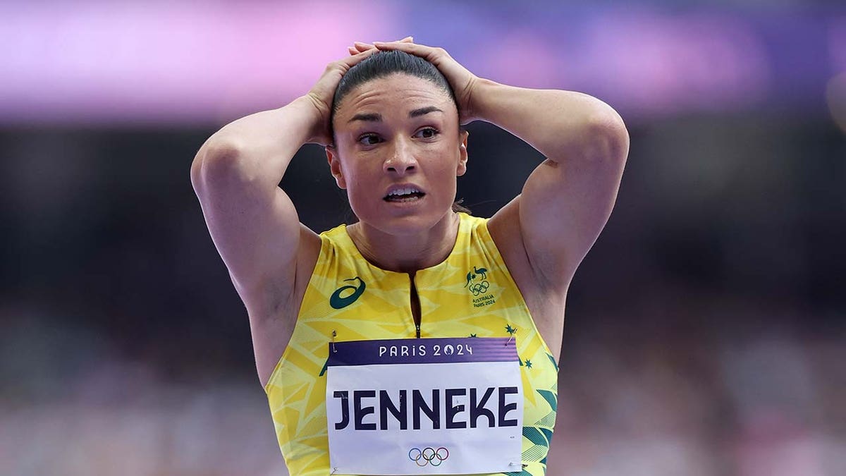 Michelle Jenneke reacts after competing