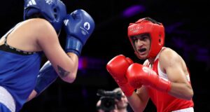 Olympic boxer who failed gender test wins quarterfinal bout, guaranteed medal