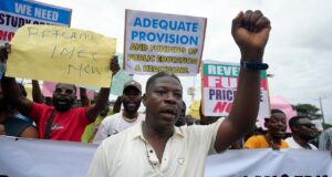 Rights group says security forces have killed 9 as Nigeria protests over hardship enter a second day