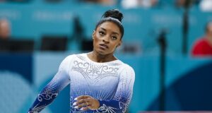 Simone Biles appears to HIT OUT at Olympics crowd after falling off beam – as teammate Suni Lee blames ‘tense’ atmosphere in Paris