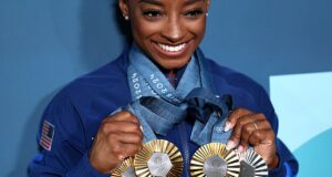 Simone Biles had therapy ‘three or four times’ during the Olympics to keep the ‘Twisties’ at bay – after saying she was ‘shaking with anxiety’ between events