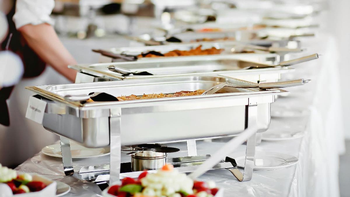Catering food displayed on a wedding event table.