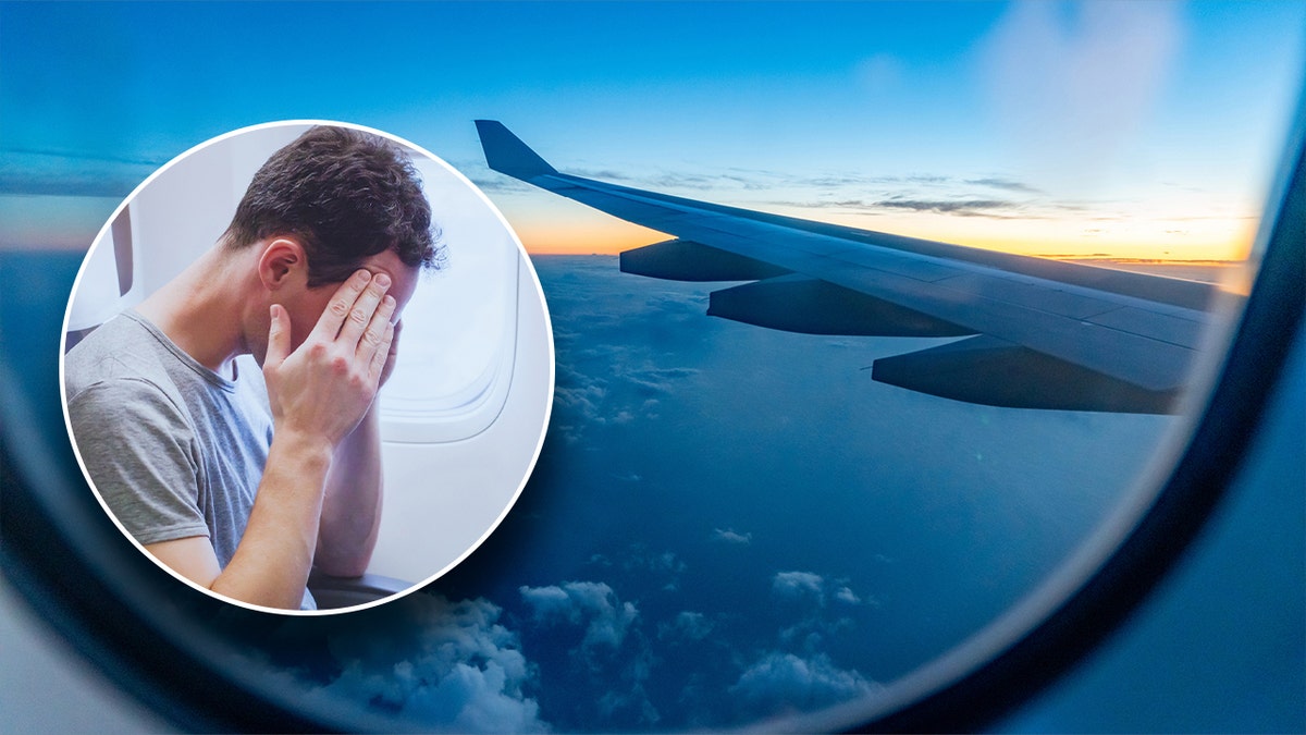 A man feeling anxious on a flight, with a view from the window seat in the background