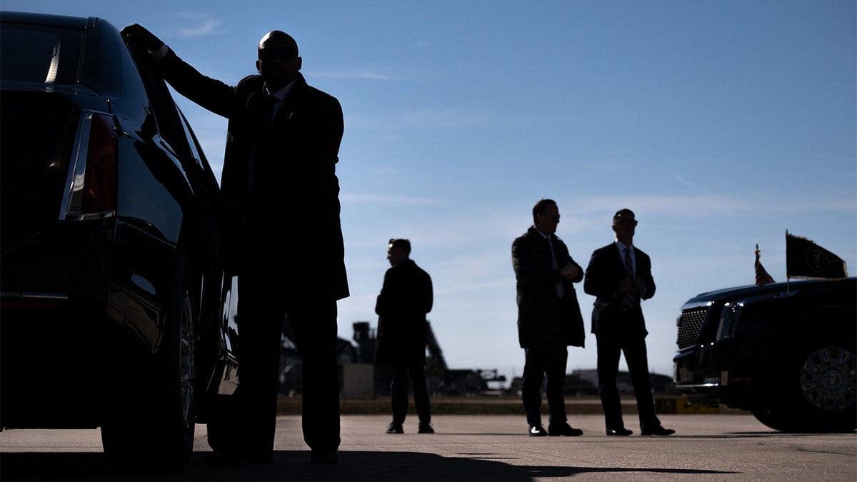 Secret Service agents securing President Biden