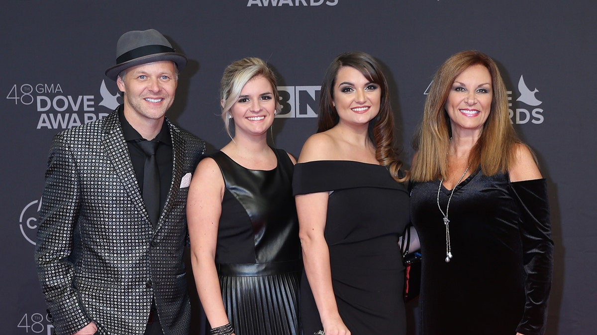 The Nelons gospel group smiles at an awards show.